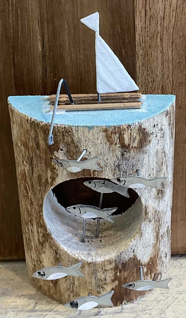 Boat on a porthole log seaside decoration 